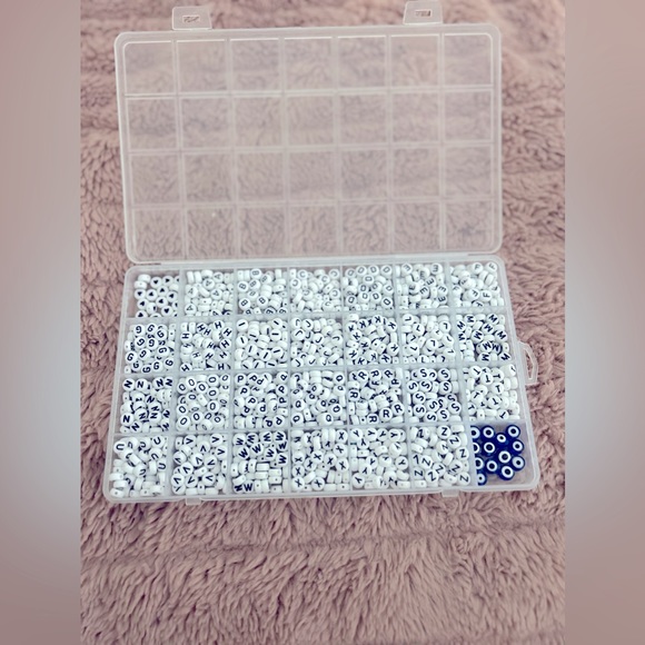 alphabet bracelet beads, comes with hearts and evil eye beads. Has not been used - Picture 1 of 2